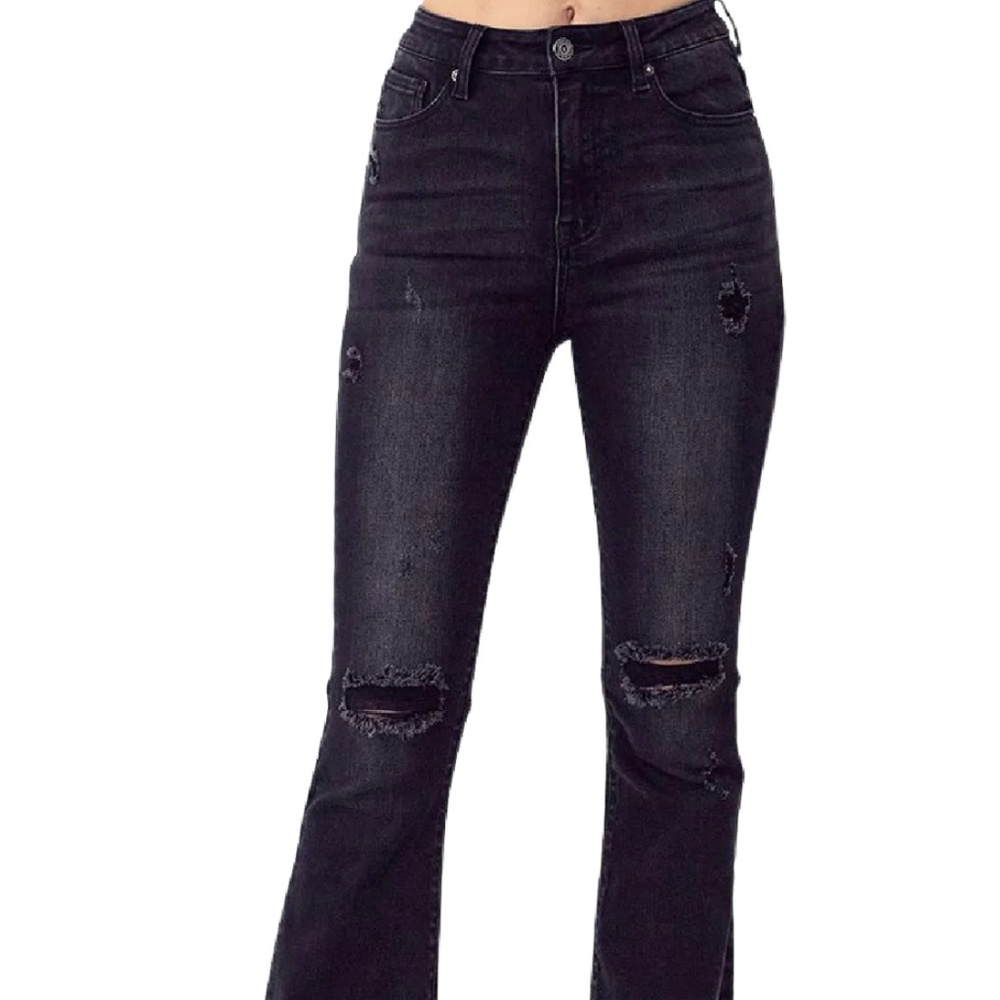Risen distressed denim jeans
